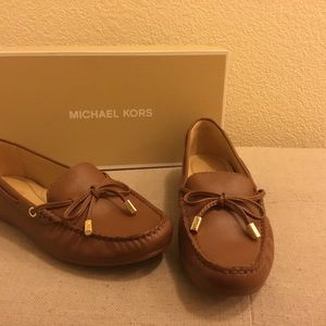 New Micheal Kors Moccasins Size 6.5 brown leather..